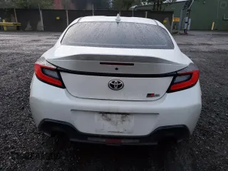 2022 Toyota GR86 Premium with VIN JF1ZNBE17N9757637, listed as a Copart auction lot 82174084 with 73,316 mi miles and Salvage Title. Bid and sale history available at carsss.com. Image 6.