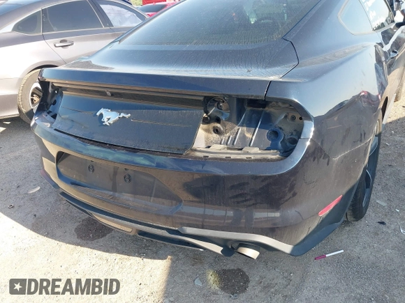 2021 Ford Mustang EcoBoost with VIN 1FA6P8TH0M5107683, listed as a IAAI auction lot 42084509 with 63,015 mi miles and . Bid and sale history available at DreamBid. Image 17.
