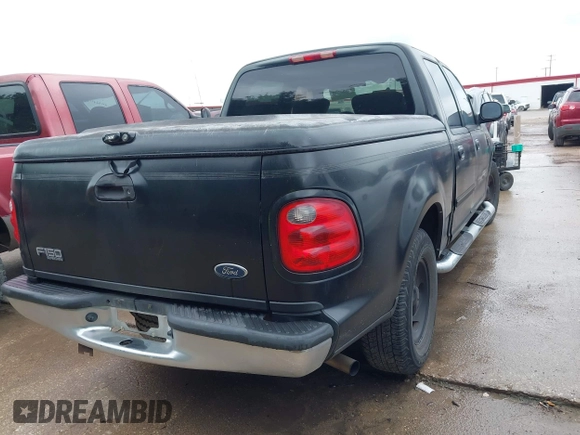 2003 Ford F-150 XLT with VIN 1FTRW07683KC30930, listed as a IAAI auction lot 42482529 with Not provided miles and . Bid and sale history available at DreamBid. Image 4.
