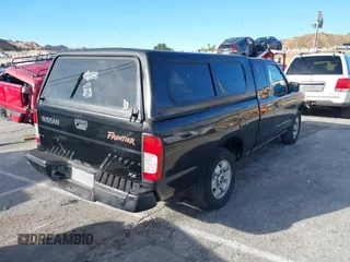 1999 Nissan Frontier XE z VIN 1N6DD26S6XC329964, wystawiony jako IAAI lot #41227011 z przebiegiem 199 039 mil mil oraz . Historia ofert i sprzedaży dostępna na DreamBid. Obrazek 4.