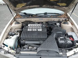 2000 Mitsubishi Diamante LS z VIN 6MMAP67P7YT005234, wystawiony jako IAAI lot #41896098 z przebiegiem 131 852 mil mil oraz . Historia ofert i sprzedaży dostępna na DreamBid. Obrazek 10.