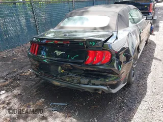 2018 Ford Mustang EcoBoost Premium z VIN 1FATP8UH4J5117856, wystawiony jako IAAI lot #42675106 z przebiegiem 110 587 mil mil oraz . Historia ofert i sprzedaży dostępna na DreamBid. Obrazek 6.