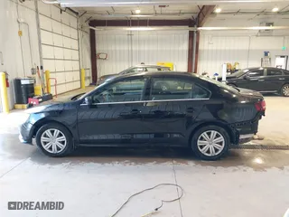 2017 Volkswagen Jetta 1.4T S with VIN 3VW167AJ5HM329706, listed as a IAAI auction lot 40801058 with 144,103 mi miles. Bid and sale history available at carsss.com. Image 15.