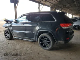 2015 Jeep Grand Cherokee Limited with VIN 1C4RJEBG7FC217855, listed as a Copart auction lot 50642135 with 124,130 mi miles and Salvage Title. Bid and sale history available at carsss.com. Image 2.