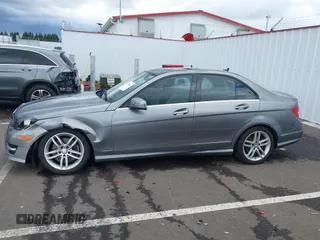 2014 Mercedes-Benz C with VIN WDDGF8AB5ER318166, listed as a IAAI auction lot 41911146 with 115,691 mi miles. Bid and sale history available at carsss.com. Image 14.