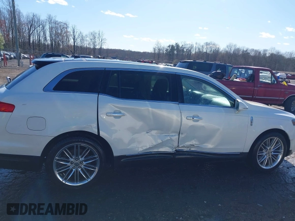 2013 Lincoln MKT EcoBoost with VIN 2LMHJ5AT8DBL55167, listed as a IAAI auction lot 41894396 with 121,114 mi miles. Bid and sale history available at carsss.com. Image 13.