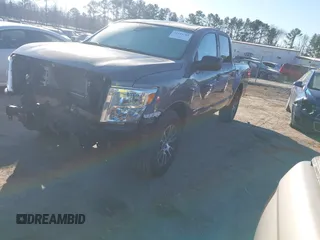 2022 Nissan Titan SV with VIN 1N6AA1EE3NN104176, listed as a IAAI auction lot 41159789 with 53,991 mi miles and . Bid and sale history available at DreamBid. Image 2.