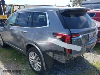2020 Cadillac XT6 FWD Premium Luxury with VIN 1GYKPCRSXLZ105231, listed as a IAAI auction lot 41735556 with 70,319 mi miles. Bid and sale history available at carsss.com. Image 3.