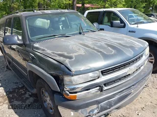 2004 Chevrolet Suburban LT z VIN 1GNFK16T84J236303, wystawiony jako IAAI lot #42079367 z przebiegiem 274 111 mil mil oraz . Historia ofert i sprzedaży dostępna na DreamBid. Obrazek 1.