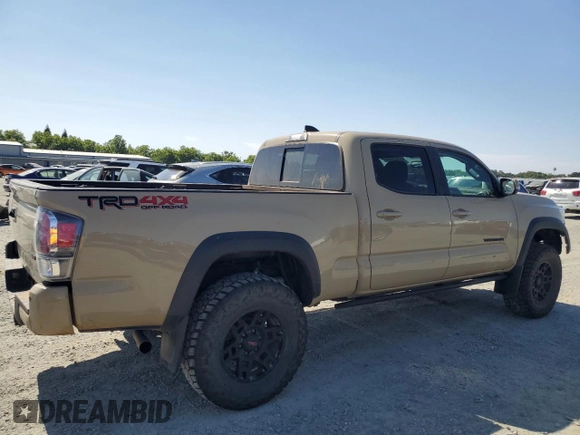 2020 Toyota Tacoma SR5 with VIN 3TMDZ5BN3LM087312, listed as a Copart auction lot 57876405 with 49,201 mi miles and Salvage title. Bid and sale history available at DreamBid. Image 3.