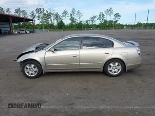 2005 Nissan Altima S z VIN 1N4AL11D45N498626, wystawiony jako IAAI lot #42332539 z przebiegiem 132 446 mil mil oraz . Historia ofert i sprzedaży dostępna na DreamBid. Obrazek 14.