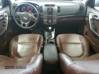 2010 Kia Forte EX z VIN KNAFU4A27A5230657, wystawiony jako Copart lot #58817345 z przebiegiem 63 949 mil mil oraz Nie do naprawy • Non repairable. Historia ofert i sprzedaży dostępna na DreamBid. Obrazek 8.