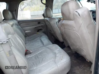 2003 Chevrolet Tahoe LS z VIN 1GNEC13Z73R121712, wystawiony jako IAAI lot #41754849 z przebiegiem Nie podano mil oraz . Historia ofert i sprzedaży dostępna na DreamBid. Obrazek 8.