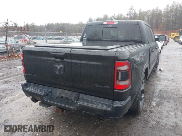 2021 Ram 1500 Limited with VIN 1C6SRFHT3MN500590, listed as a IAAI auction lot 41117602 with 81,875 mi miles and . Bid and sale history available at DreamBid. Image 16.