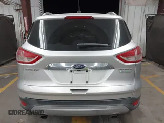 2015 Ford Escape Titanium with VIN 1FMCU0J96FUB81598, listed as a IAAI auction lot 41872114 with 122,001 mi miles and . Bid and sale history available at DreamBid. Image 16.