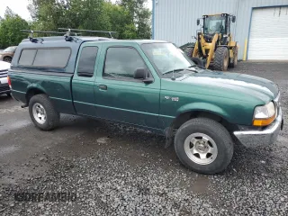 1999 Ford Ranger XL with VIN 1FTYR14V6XPA93323, listed as a Copart auction lot 59769985 with 345,075 mi miles and Salvage title. Bid and sale history available at DreamBid. Image 4.