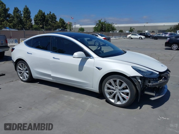 2020 Tesla Model 3 Long Range z VIN 5YJ3E1EB7LF628030, wystawiony jako IAAI lot #42357277 z przebiegiem 82 379 mil mil oraz . Historia ofert i sprzedaży dostępna na DreamBid. Obrazek 1.