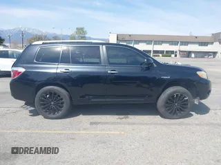 2009 Toyota Highlander Hybrid with VIN JTEEW41A592026819, listed as a IAAI auction lot 41837703 with 216,588 mi miles. Bid and sale history available at carsss.com. Image 13.