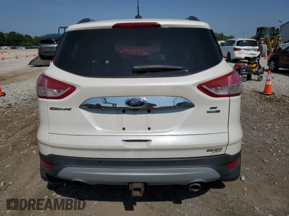 2014 Ford Escape SE z VIN 1FMCU9G92EUC58400, wystawiony jako Copart lot #60491005 z przebiegiem 72 462 mil mil oraz Szkoda całkowita • Salvage title. Historia ofert i sprzedaży dostępna na DreamBid. Obrazek 6.