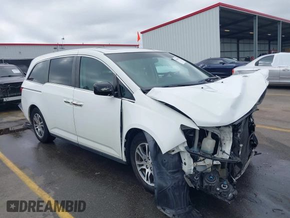 2012 Honda Odyssey EX-L with VIN 5FNRL5H60CB134954, listed as a IAAI auction lot 41942488 with 192,069 mi miles and . Bid and sale history available at DreamBid. Image 1.