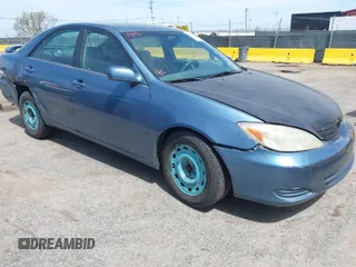 2004 Toyota Camry LE with VIN 4T1BE32K14U793314, listed as a IAAI auction lot 42031924 with 169,164 mi miles. Bid and sale history available at carsss.com. Image 1.
