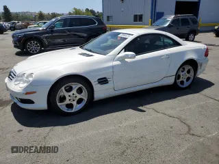 2004 Mercedes-Benz SL 500 with VIN WDBSK75F24F067063, listed as a Copart auction lot 59964475 with 73,567 mi miles and Salvage title. Bid and sale history available at DreamBid. Image 1.