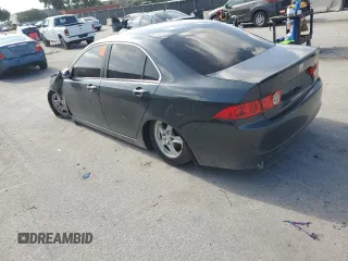2004 Acura TSX w/Navigation z VIN JH4CL96944C031396, wystawiony jako Copart lot #60472635 z przebiegiem Nie podano mil oraz Szkoda całkowita • Salvage title. Historia ofert i sprzedaży dostępna na DreamBid. Obrazek 8.
