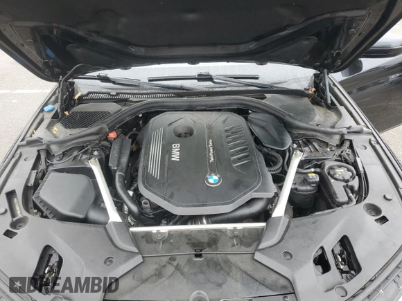 2019 BMW 5 Series 540i xDrive with VIN WBAJE7C54KWW19994, listed as a Copart auction lot 57973055 with 121,995 mi miles and Salvage title. Bid and sale history available at DreamBid. Image 11.
