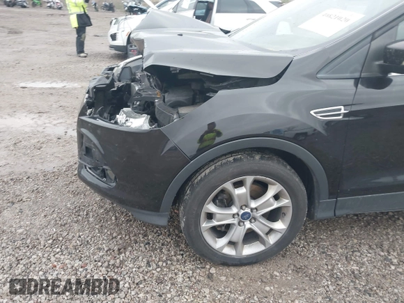 2013 Ford Escape SEL with VIN 1FMCU9H95DUC64995, listed as a IAAI auction lot 40821020 with 120,114 mi miles. Bid and sale history available at carsss.com. Image 6.