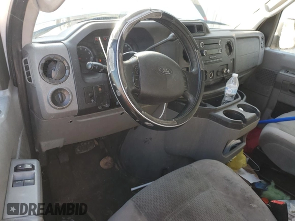 2011 Ford Econoline Passenger XL with VIN 1FBNE3BLXBDA42711, listed as a Copart auction lot 44326425 with 476,137 mi miles and Salvage Title. Bid and sale history available at carsss.com. Image 8.