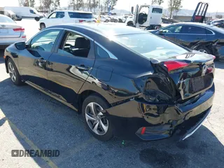 2020 Honda Civic LX z VIN 19XFC2F6XLE212683, wystawiony jako IAAI lot #41745743 z przebiegiem 81 553 mil mil oraz . Historia ofert i sprzedaży dostępna na DreamBid. Obrazek 3.