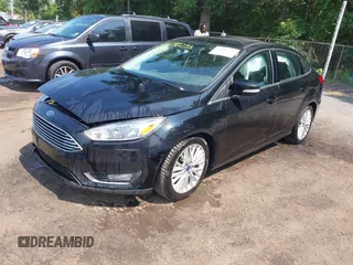 2018 Ford Focus Titanium with VIN 1FADP3J22JL220986, listed as a IAAI auction lot 42410253 with 40,791 mi miles and . Bid and sale history available at DreamBid. Image 17.