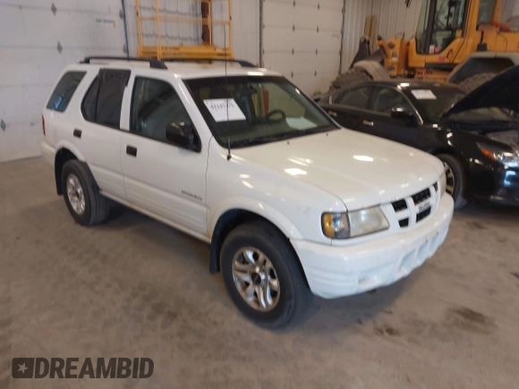2004 Isuzu Rodeo S with VIN 4S2CK58W244313115, listed as a IAAI auction lot 42147475 with 186,594 mi miles and . Bid and sale history available at DreamBid. Image 1.