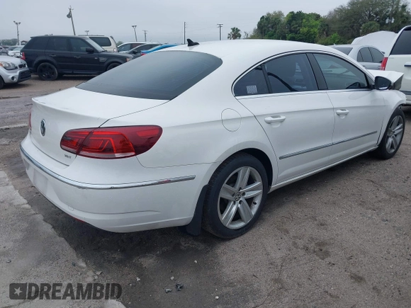 2013 Volkswagen CC Sport Plus z VIN WVWBP7AN6DE557611, wystawiony jako IAAI lot #41663021 z przebiegiem 130 393 mil mil oraz . Historia ofert i sprzedaży dostępna na DreamBid. Obrazek 4.