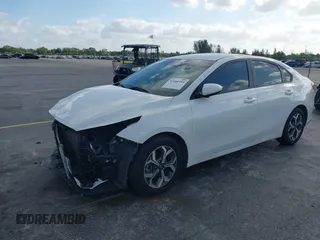 2021 Kia Forte FE with VIN 3KPF24AD7ME349327, listed as a IAAI auction lot 42166949 with 71,217 mi miles and . Bid and sale history available at DreamBid. Image 2.