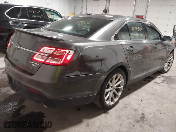 2015 Ford Taurus Limited with VIN 1FAHP2J86FG106828, listed as a IAAI auction lot 41748997 with 221,216 mi miles. Bid and sale history available at carsss.com. Image 4.