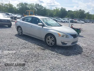 2014 Nissan Altima SL with VIN 1N4BL3AP7EC299303, listed as a IAAI auction lot 42487370 with 134,767 mi miles and . Bid and sale history available at DreamBid. Image 1.
