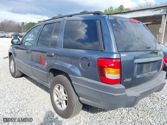 2004 Jeep Grand Cherokee Laredo with VIN 1J4GX48S14C324581, listed as a IAAI auction lot 41717938 with 213,178 mi miles. Bid and sale history available at carsss.com. Image 3.