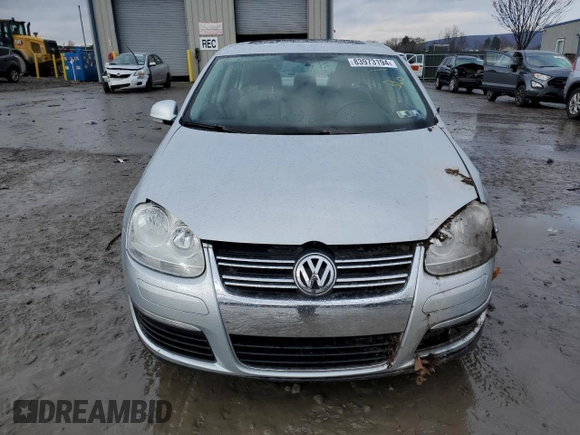 2009 Volkswagen Jetta SE z VIN 3VWRZ71K89M062050, wystawiony jako Copart lot #83973194 z przebiegiem 48 996 mil mil oraz Szkoda całkowita • Salvage title. Historia ofert i sprzedaży dostępna na DreamBid. Obrazek 5.