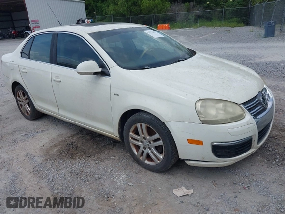 2007 Volkswagen Jetta Wolfsburg Edition z VIN 3VWEF71K47M192184, wystawiony jako IAAI lot #42573483 z przebiegiem 207 809 mil mil oraz . Historia ofert i sprzedaży dostępna na DreamBid. Obrazek 1.