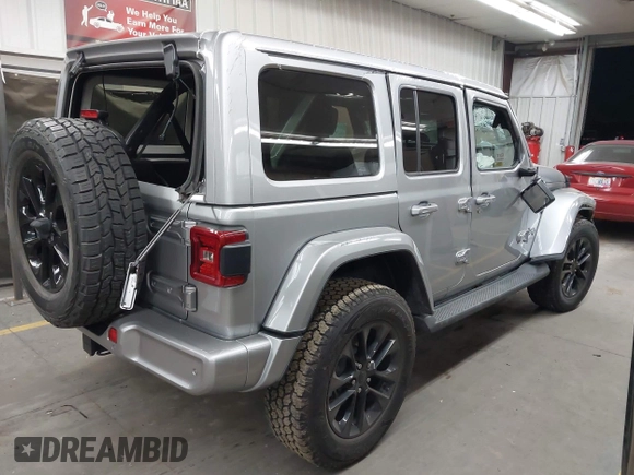 2021 Jeep Wrangler Unlimited Sahara with VIN 1C4HJXEN1MW529568, listed as a IAAI auction lot 42336590 with 39,931 mi miles and . Bid and sale history available at DreamBid. Image 4.