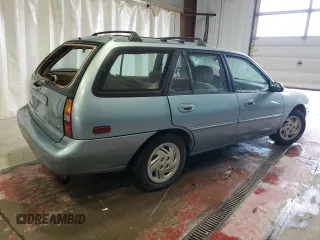 1997 Ford Escort LX with VIN 3FALP15P9VR107467, listed as a Copart auction lot 76061074 with 69,873 mi miles and Clean Title. Bid and sale history available at carsss.com. Image 3.
