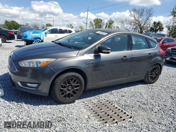 2015 Ford Focus Titanium with VIN 1FADP3N24FL260486, listed as a Copart auction lot 49856865 with Not provided miles and Clean title. Bid and sale history available at DreamBid. Image 1.