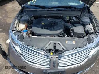 2016 Lincoln MKZ z VIN 3LN6L2J97GR617086, wystawiony jako IAAI lot #42446924 z przebiegiem 107 591 mil mil oraz . Historia ofert i sprzedaży dostępna na DreamBid. Obrazek 10.