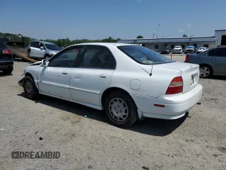 1994 Honda Accord с VIN 1HGCD5642RA166652, выставлен на аукционе Copart как лот 57225365 с пробегом 247 643 миль миль и Списание • Salvage title. История ставок и продаж доступна на DreamBid. Изображение 2.