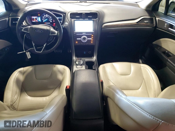 2017 Ford Fusion Titanium z VIN 3FA6P0D99HR162354, wystawiony jako Copart lot #61753395 z przebiegiem 100 678 mil mil oraz Szkoda całkowita • Salvage title. Historia ofert i sprzedaży dostępna na DreamBid. Obrazek 8.