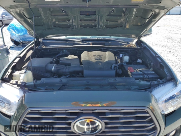 2022 Toyota Tacoma SR z VIN 3TMCZ5AN6NM479653, wystawiony jako Copart lot #47704285 z przebiegiem 57 618 mil mil oraz Szkoda całkowita • Salvage title. Historia ofert i sprzedaży dostępna na DreamBid. Obrazek 12.