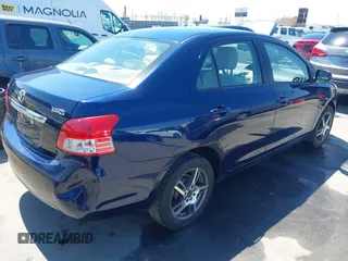 2008 Toyota Yaris with VIN JTDBT923881276508, listed as a IAAI auction lot 42001178 with 165,579 mi miles. Bid and sale history available at carsss.com. Image 4.