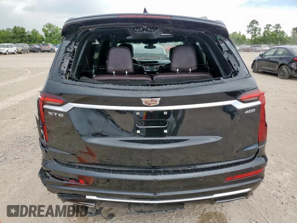 2024 Cadillac XT6 FWD Premium Luxury with VIN 1GYKPCRS7RZ709179, listed as a Copart auction lot 62374585 with 19,442 mi miles and Salvage title. Bid and sale history available at DreamBid. Image 6.
