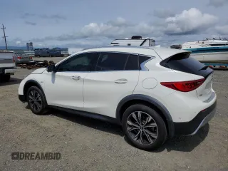2019 Infiniti QX30 Luxe with VIN SJKCH5CR7KA011861, listed as a Copart auction lot 52147015 with 77,905 mi miles and Salvage title. Bid and sale history available at DreamBid. Image 2.